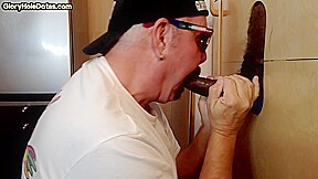 Gloryhole mature DILF blowing and tugging black cock
