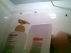 Hairy bush and small tits woman showering