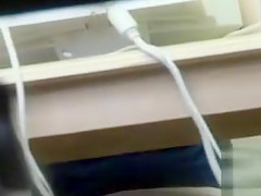 Hairy pussy upskirt in a college computer lab