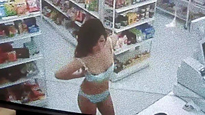 Horny babe pulls off her panties on the toilet to masturbate