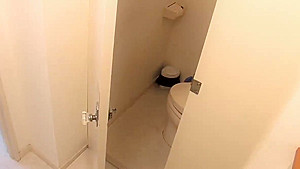 Horny babe pulls off her panties on the toilet to masturbate