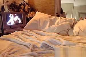 Hot Tranny Watching Porn while Toying her Ass