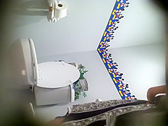 Hot girl in long dress caught peeing