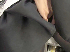 Hot maid masturbates in the kitchen with a toy