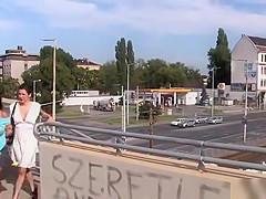 Huge tits brunette strung up in public