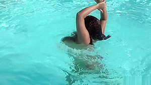 Issy aka Dominican Poison playing in the pool