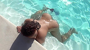 Issy aka Dominican Poison playing in the pool