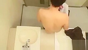 Japanese Chick Gives Blowjob In The Bathroom