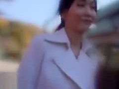 Japanese beauty gives blowjob outdoor