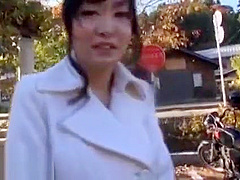 Japanese beauty gives blowjob outdoor