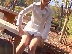 Japanese beauty gives blowjob outdoor