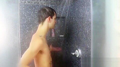 Jasper Robinson enjoys jerking his cock while showering
