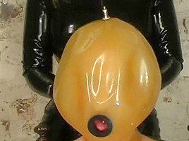 Latex slave girl tortured