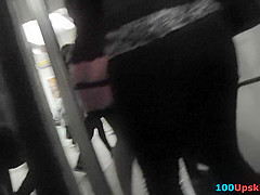 Long-legged brunette shows g-string in candid upskirts