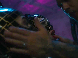 Man with tattoo on the body have arranged for the girls in latex group   