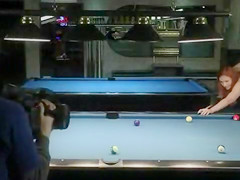 Naked babes play a game of competitive pool