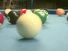 Naked babes play a game of competitive pool
