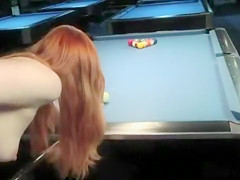 Naked babes play a game of competitive pool