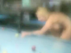 Naked babes play a game of competitive pool