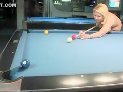 Naked babes play a game of competitive pool