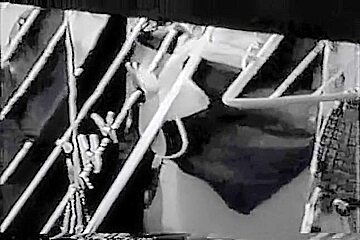 Nude Latin chick spied doing her laundry thru the window