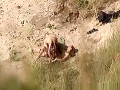 Nudist blowjob in the beach