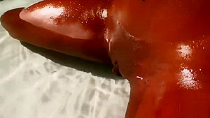 Oiled black babe gets her slit destroyed
