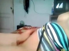 Perverted girl in mask enjoys in masturbation video