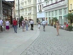 Pretty NIP Activity girl Nichola walks nude through town