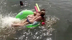 Raunchy babes have fun in the water
