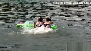 Raunchy babes have fun in the water