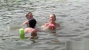Raunchy babes have fun in the water