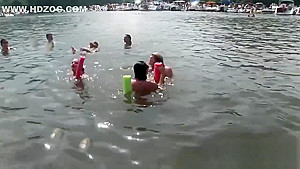 Raunchy babes have fun in the water
