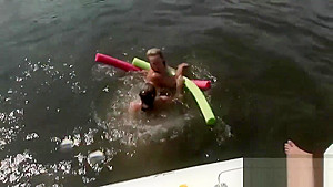 Raunchy babes have fun in the water