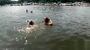 Raunchy babes have fun in the water