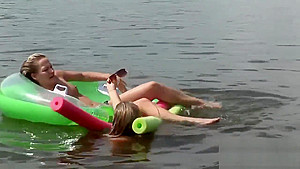Raunchy babes have fun in the water