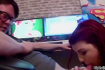 Red head Lucy Lane loves to lick the cock of this nerd  She