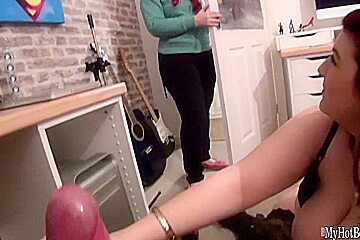 Red head Lucy Lane loves to lick the cock of this nerd  She