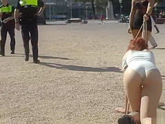 Redhead slut humiliated in public lezdom