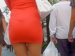 Riquisima Tail in Orange Dress