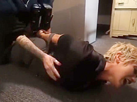 Sarhye cuffed by a Burglar