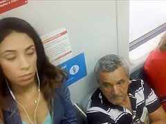 Seductive cutie has her panties recorded while riding in a train