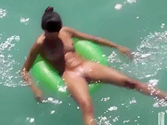 Sexy Naked Milfs Sunbathing Nude in the water