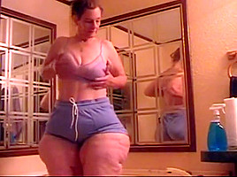 She got slimmer but that ass still wide as hell