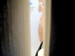 Shower cam spying the milky white boobs and cute beaver