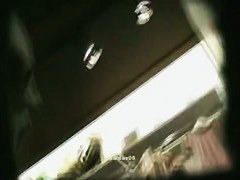 Slender Asian cutie invites an upskirt view of her butt