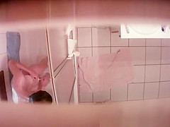 Spied in bathroom showering and shaving