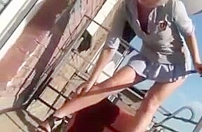 Stripping on Balcony in Public (not sure she has quite maste