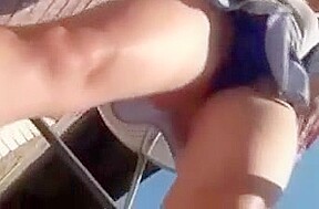 Stripping on Balcony in Public (not sure she has quite maste