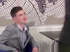 Successful young businessmen banging at the office